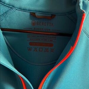 Beretta Teal Jacket with Orange Accents